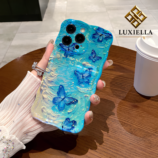 Luxiella mavi kelebek desenli telefon kılıfı, şeffaf koruyucu iphone case, 3D kabartmalı kelebekli şık tasarım, premium lüks telefon kılıfı, renkli zarif kılıf, darbeye dayanıklı silikon kapak, şeffaf ve desenli