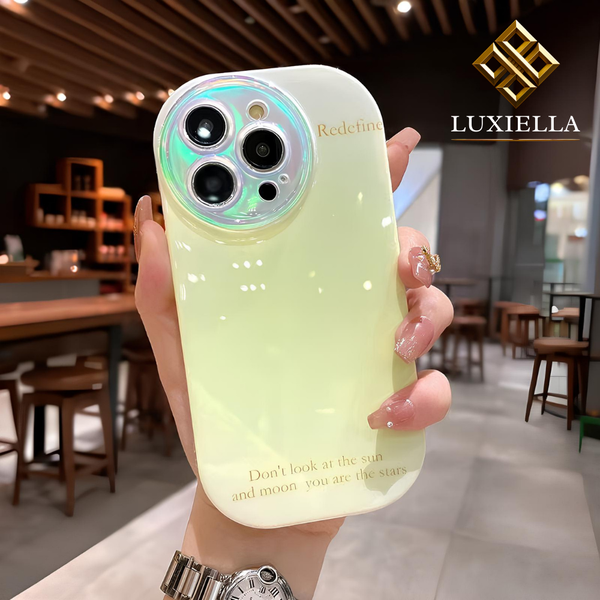 Luxiella Sarı Opal Halo Telefon Kılıfı – iPhone uyumlu, parlak ombre gövde, inci-yansımalı kamera halkası, ince & darbe korumalı yapı, esnek çerçeve + sert arka, leke/iz tutmaz yüzey, kablosuz şarj uyumlu